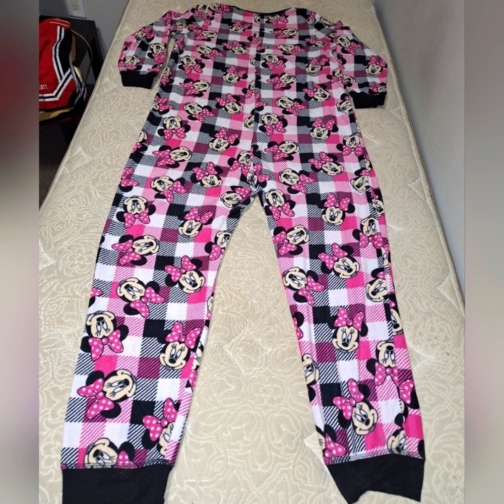 A Disney Minnie Mouse jumpsuit pajama suit. It's an adult 1XL. It's pre-loved